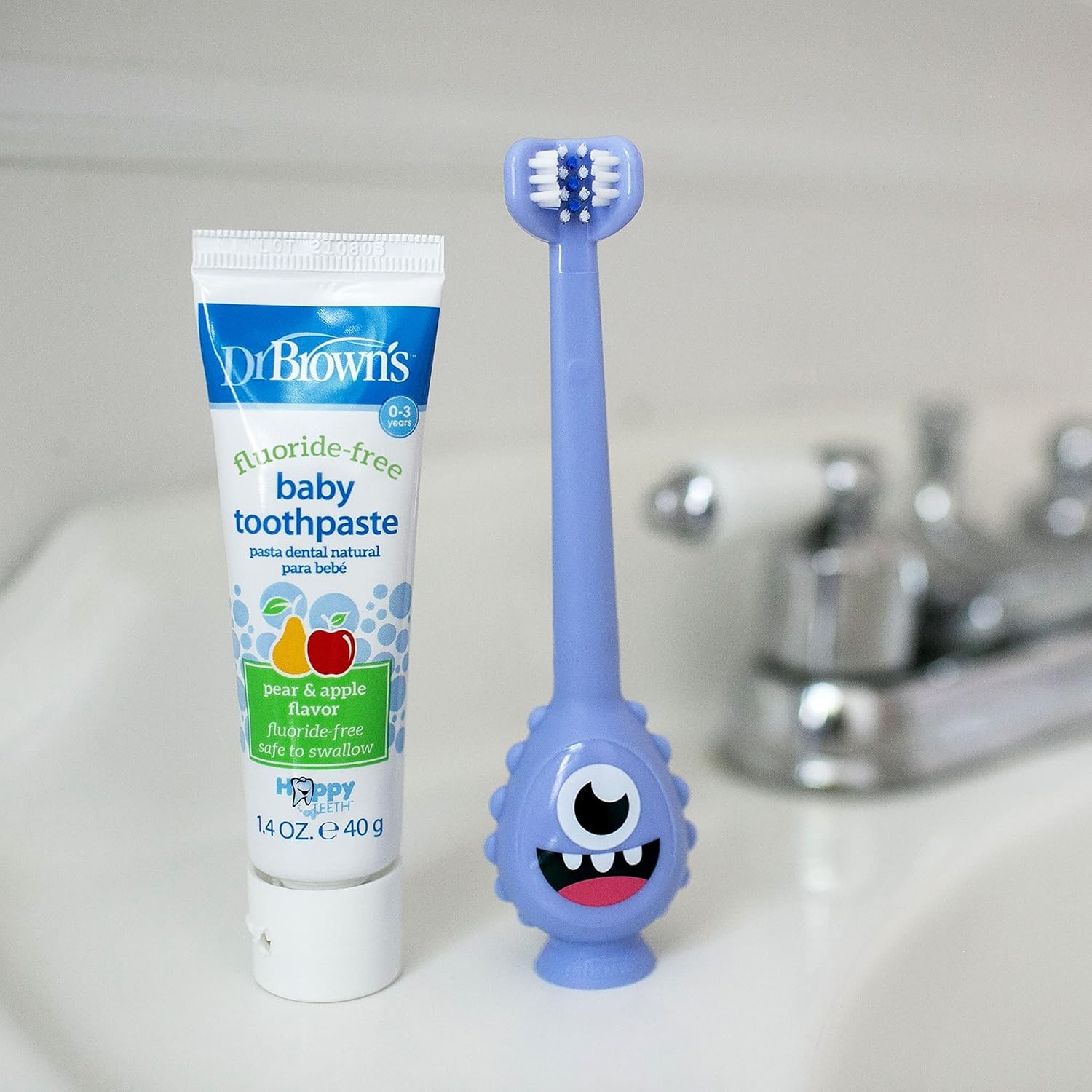image:imageDr Browns ToothScrubber Toddler Toothbrush TripleSided Training Toothbrush with Suction Cup Base Green Monster Baby Oral Care Ages 14 Years1 Pack Purple Monster